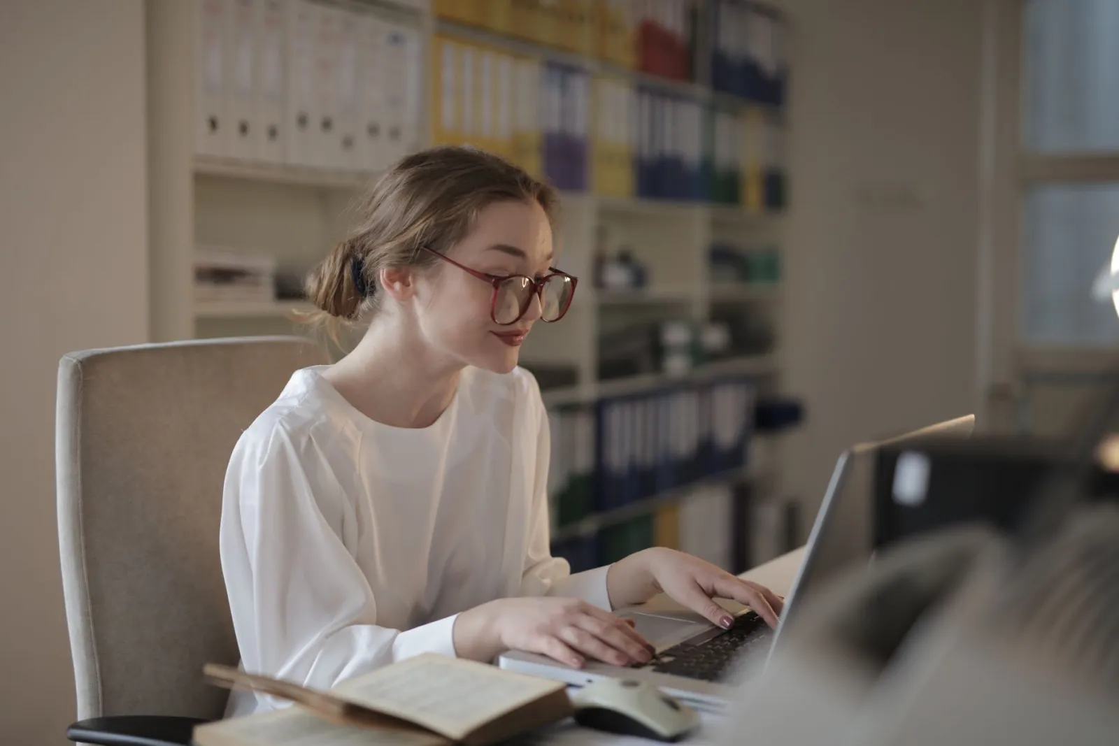 Title examiner reviewing property records
